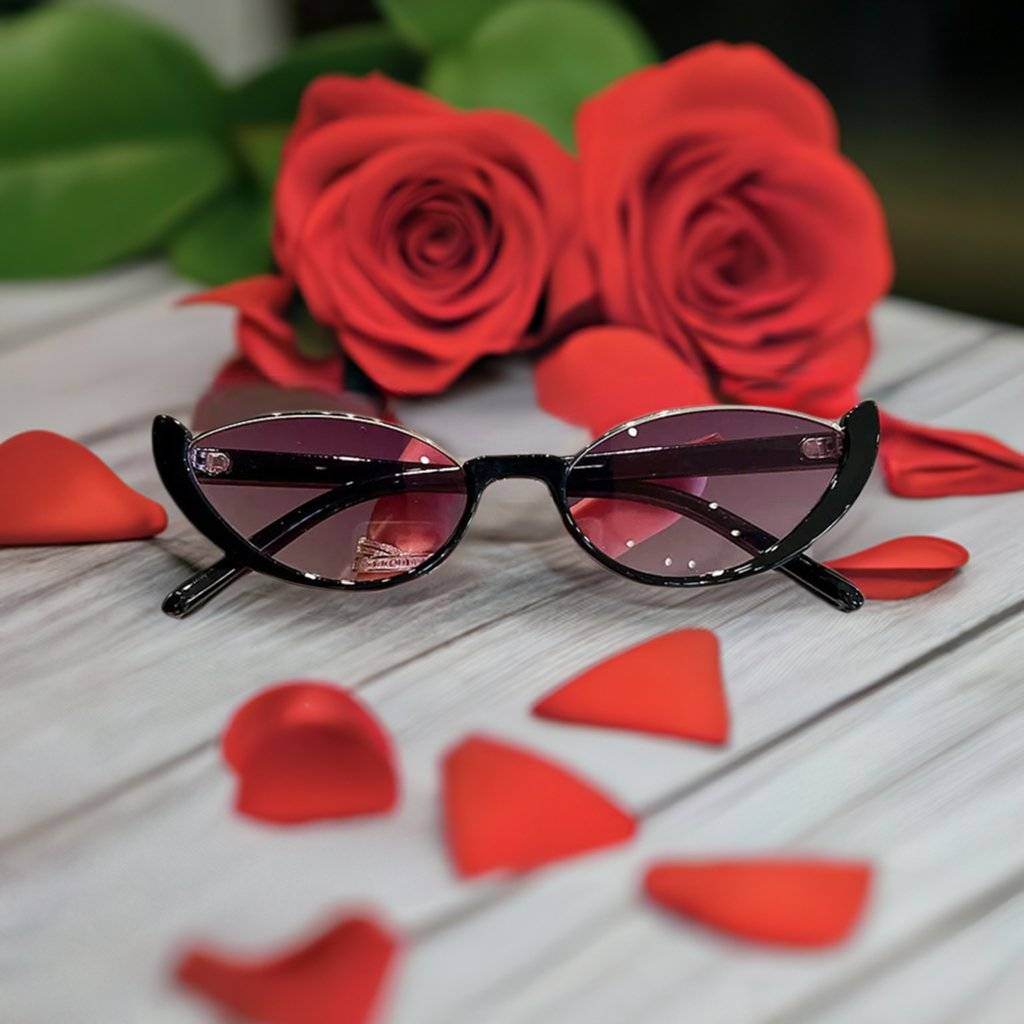 a pair of sunglasses sitting on top of a table