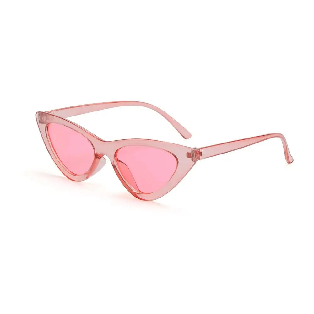 a pair of pink sunglasses on a white background