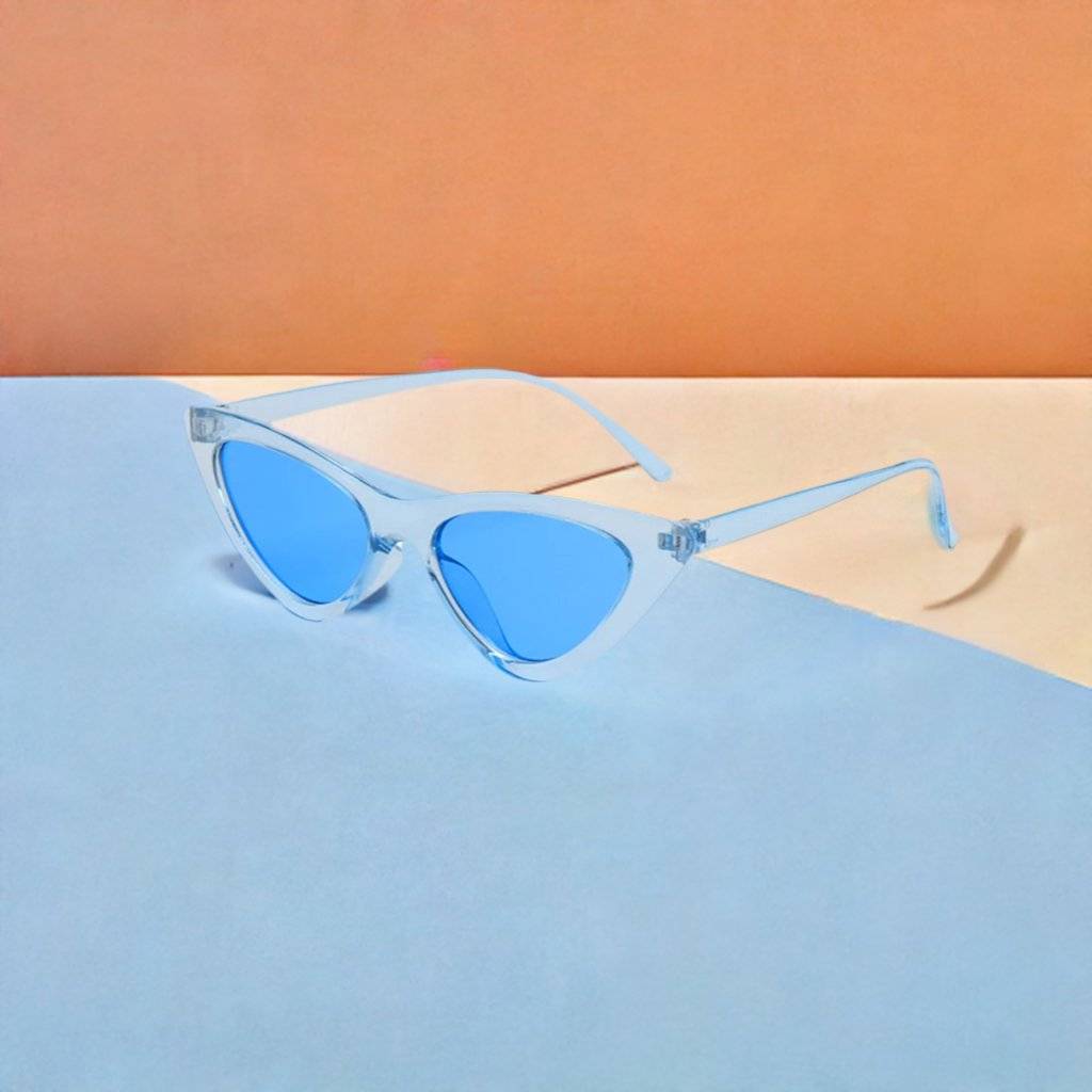 a pair of sunglasses sitting on top of a table