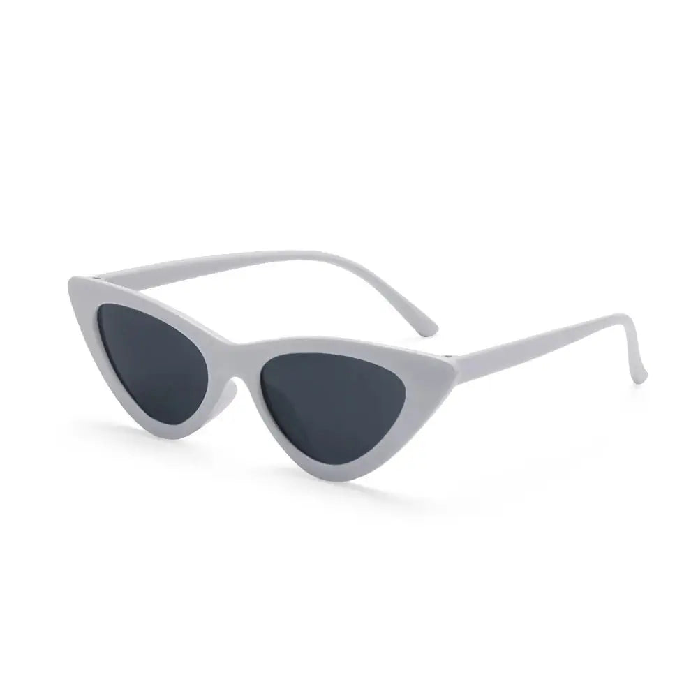 a pair of white sunglasses with black lenses