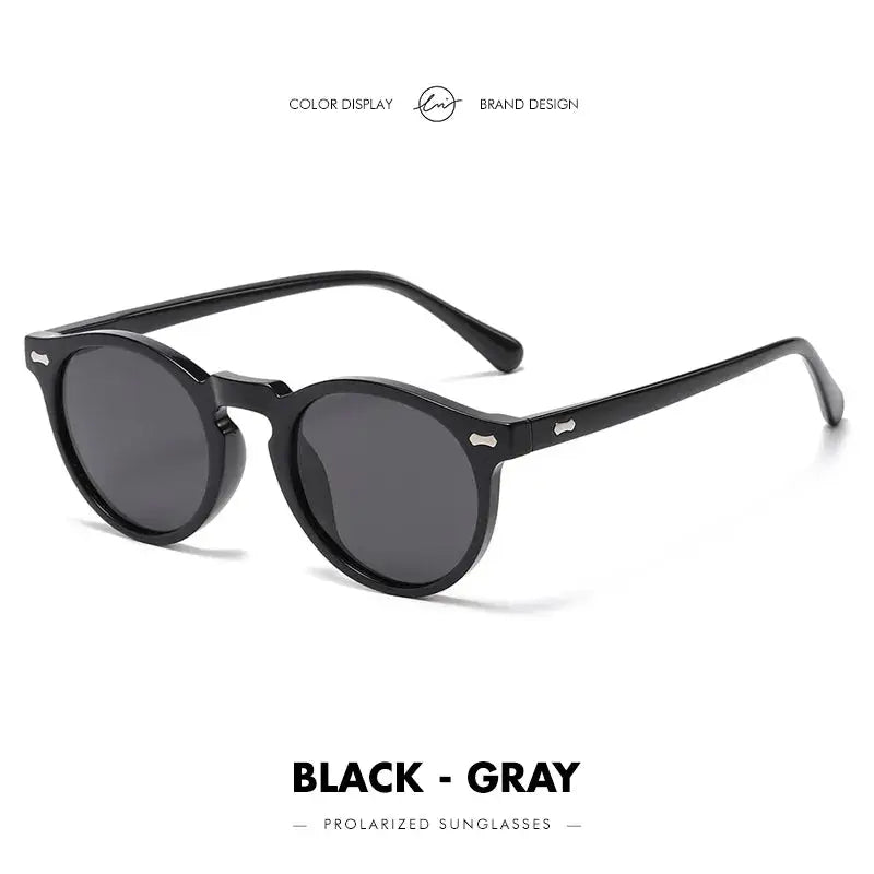 a pair of sunglasses with a black gray lens