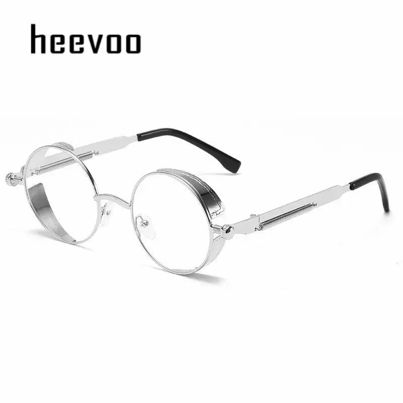 a pair of round glasses with a metal frame