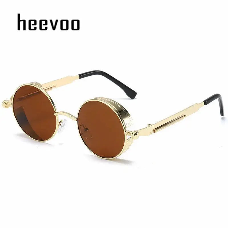 a pair of gold sunglasses with brown lenses