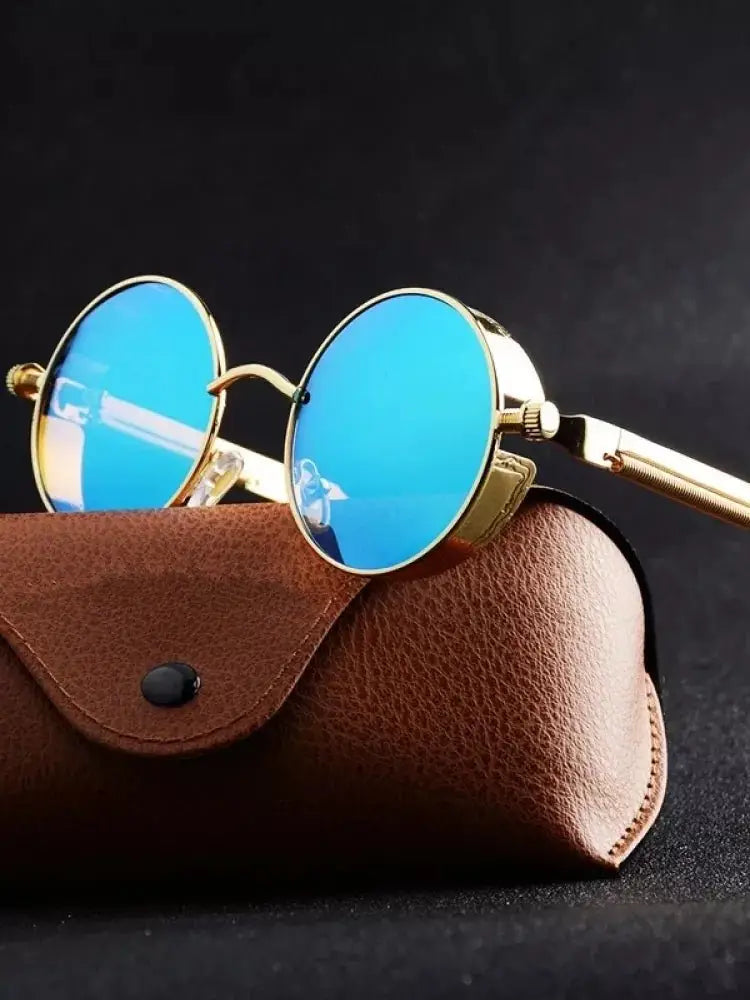 a pair of sunglasses sitting on top of a case