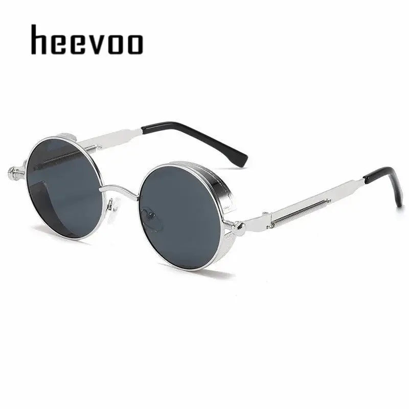 a pair of round sunglasses with a metal frame