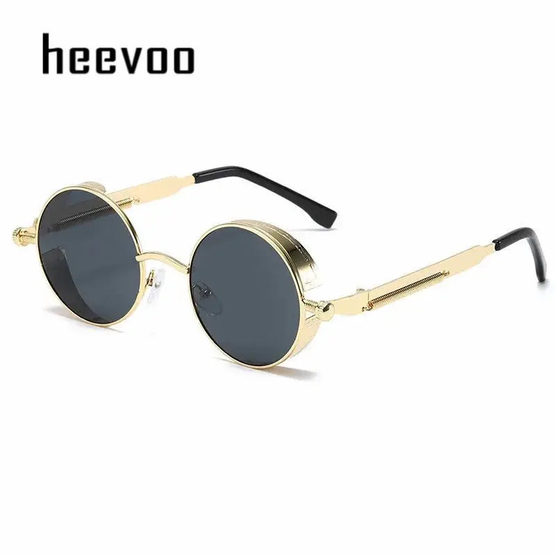 a pair of gold sunglasses with black lenses