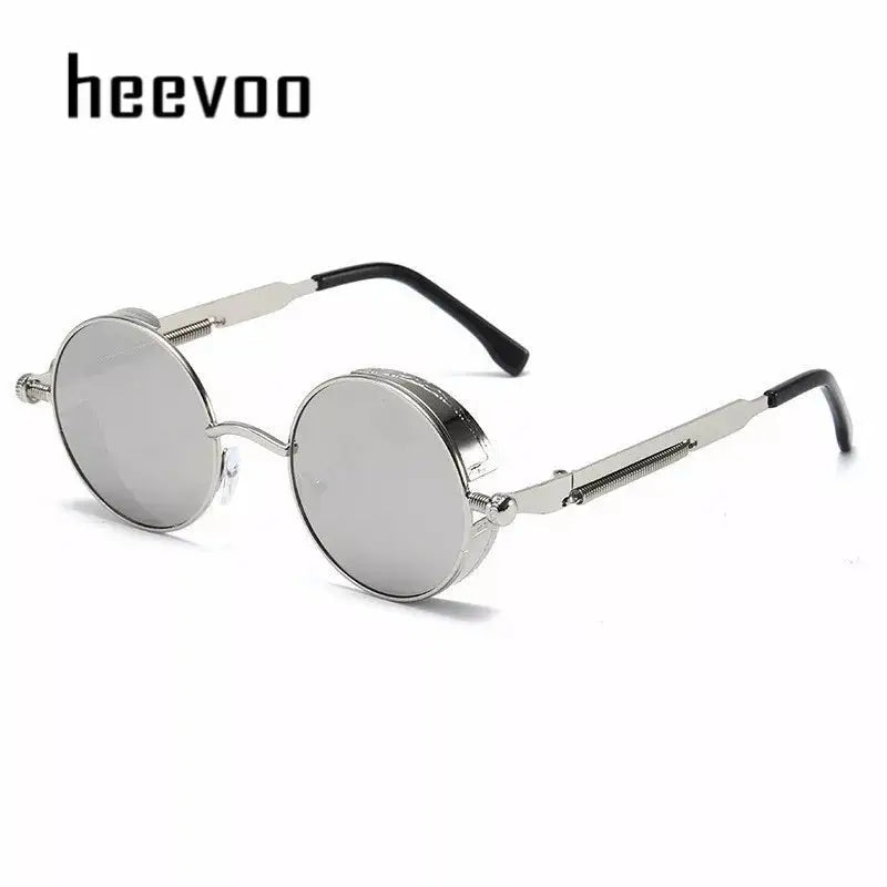 a pair of round sunglasses with a metal frame