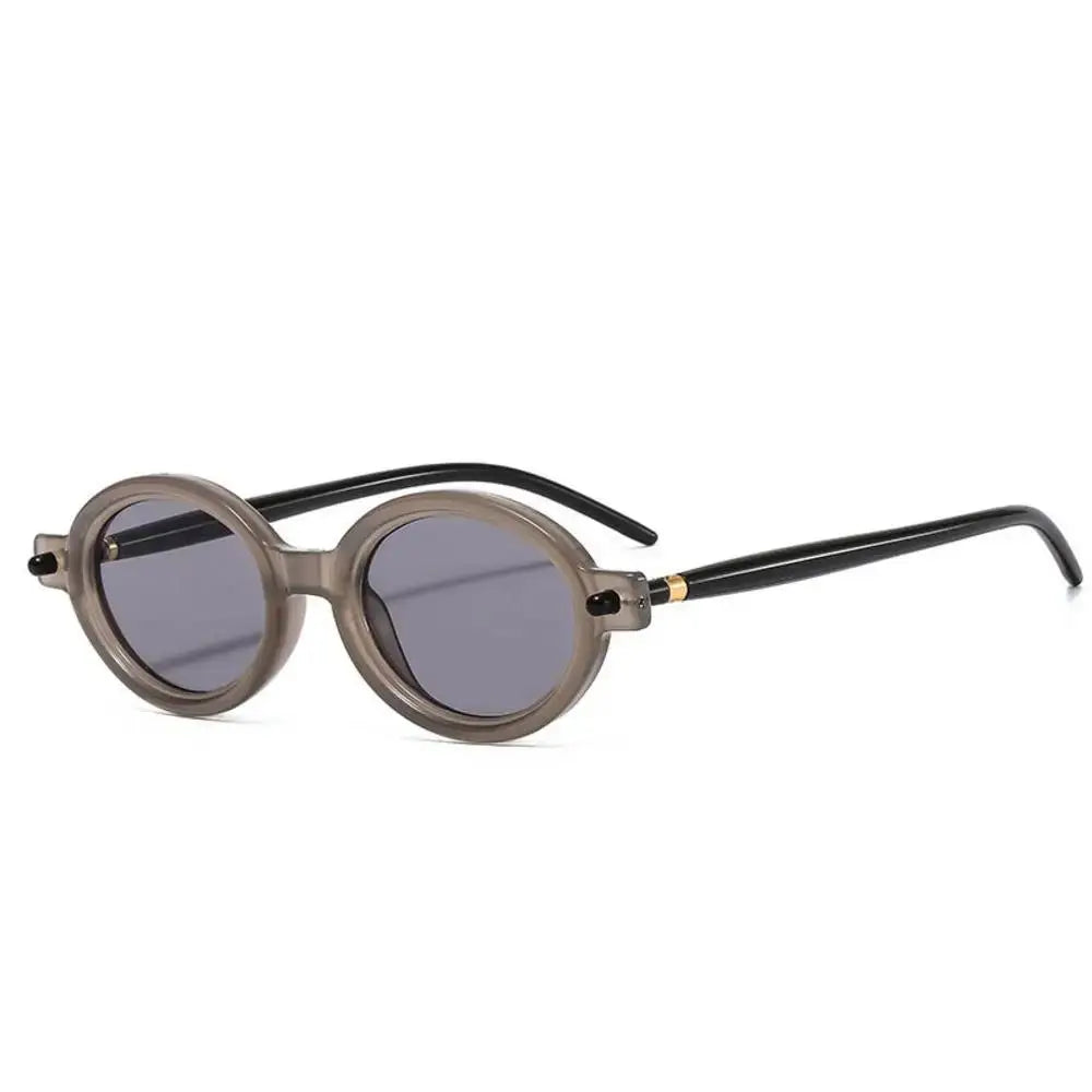 a pair of sunglasses with a round shape