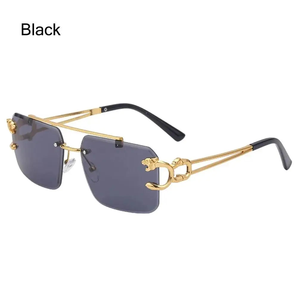 a pair of black and gold sunglasses