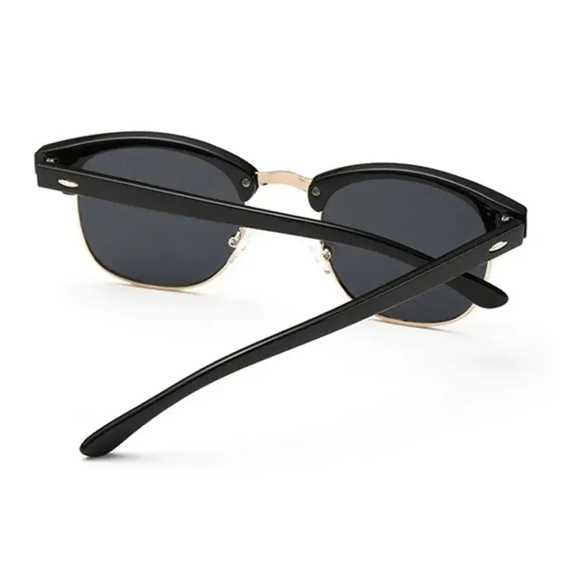 a pair of sunglasses with a black frame