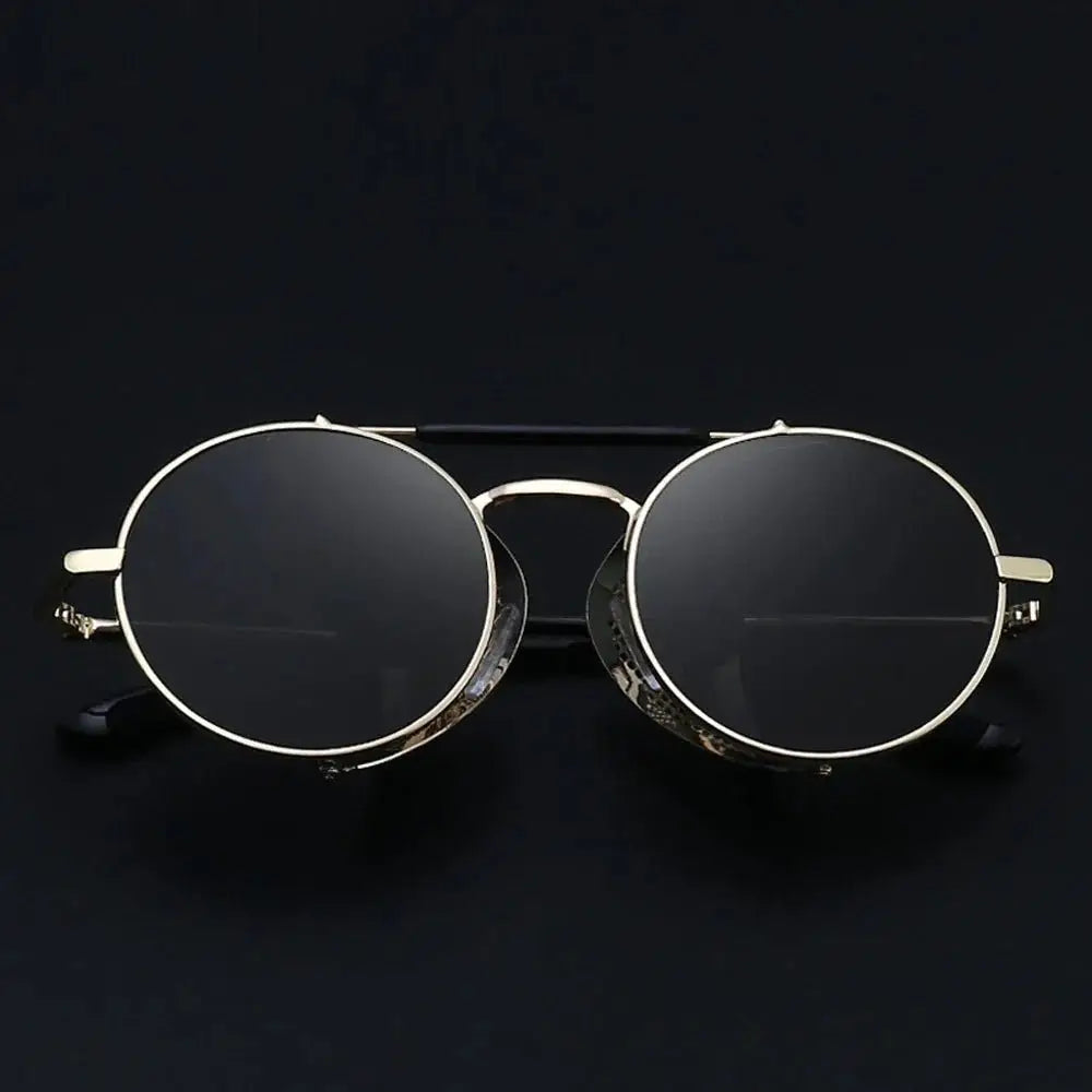 a pair of sunglasses on a black background