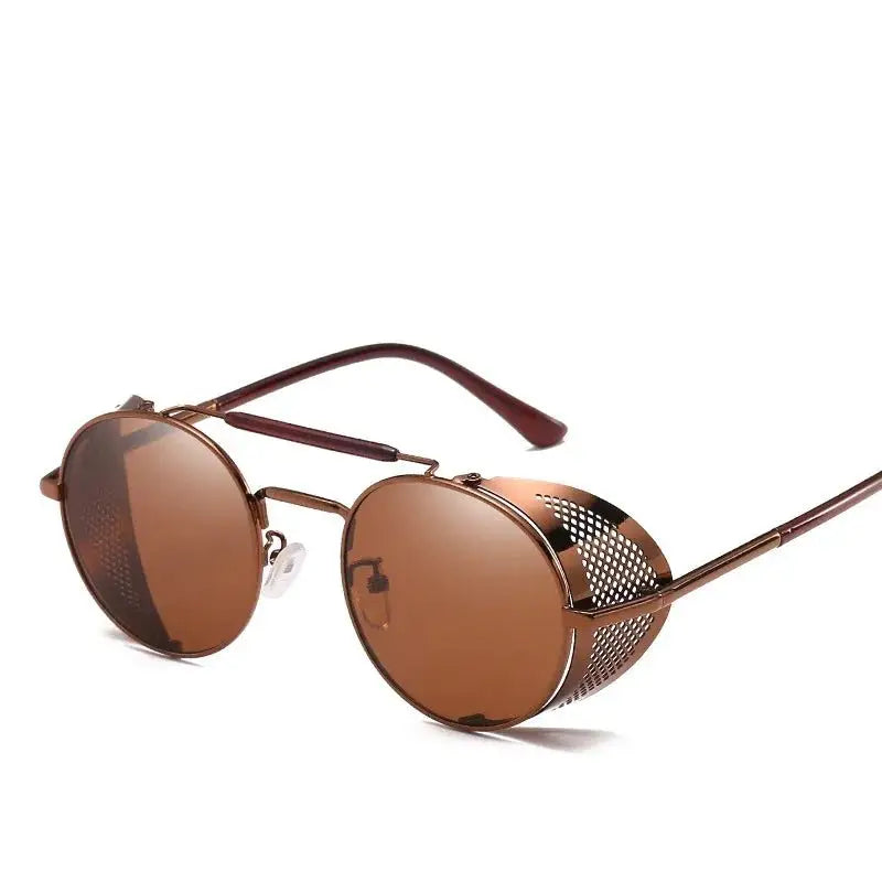 a pair of sunglasses with a metal frame and brown lens