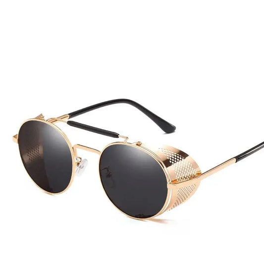 a pair of sunglasses with a gold frame and black lens