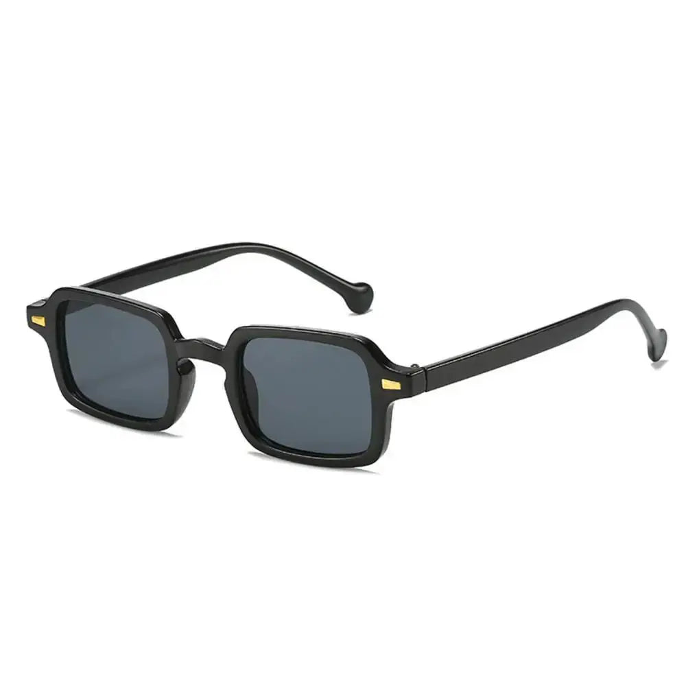 a pair of black sunglasses on a white background