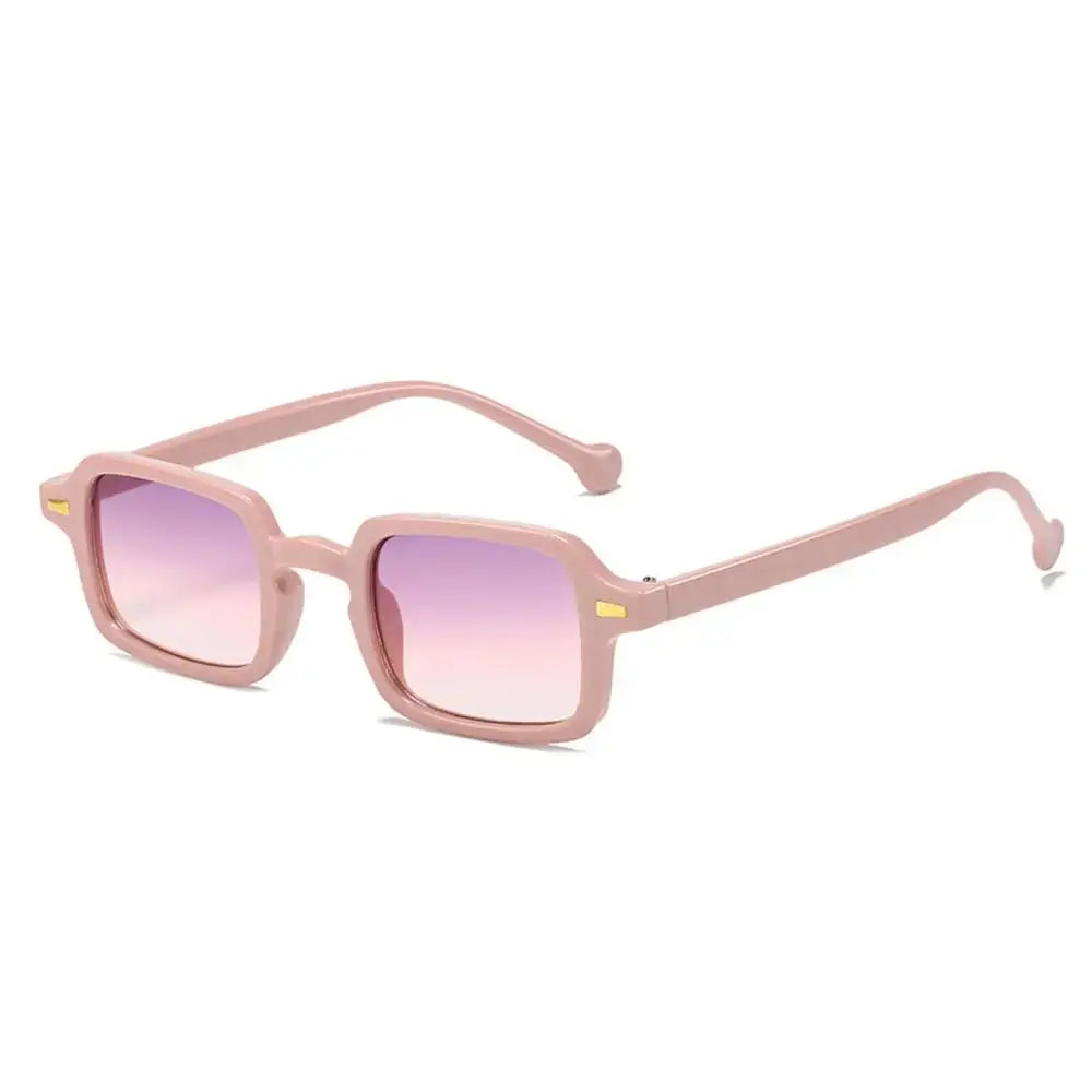 a pair of sunglasses with a pink frame