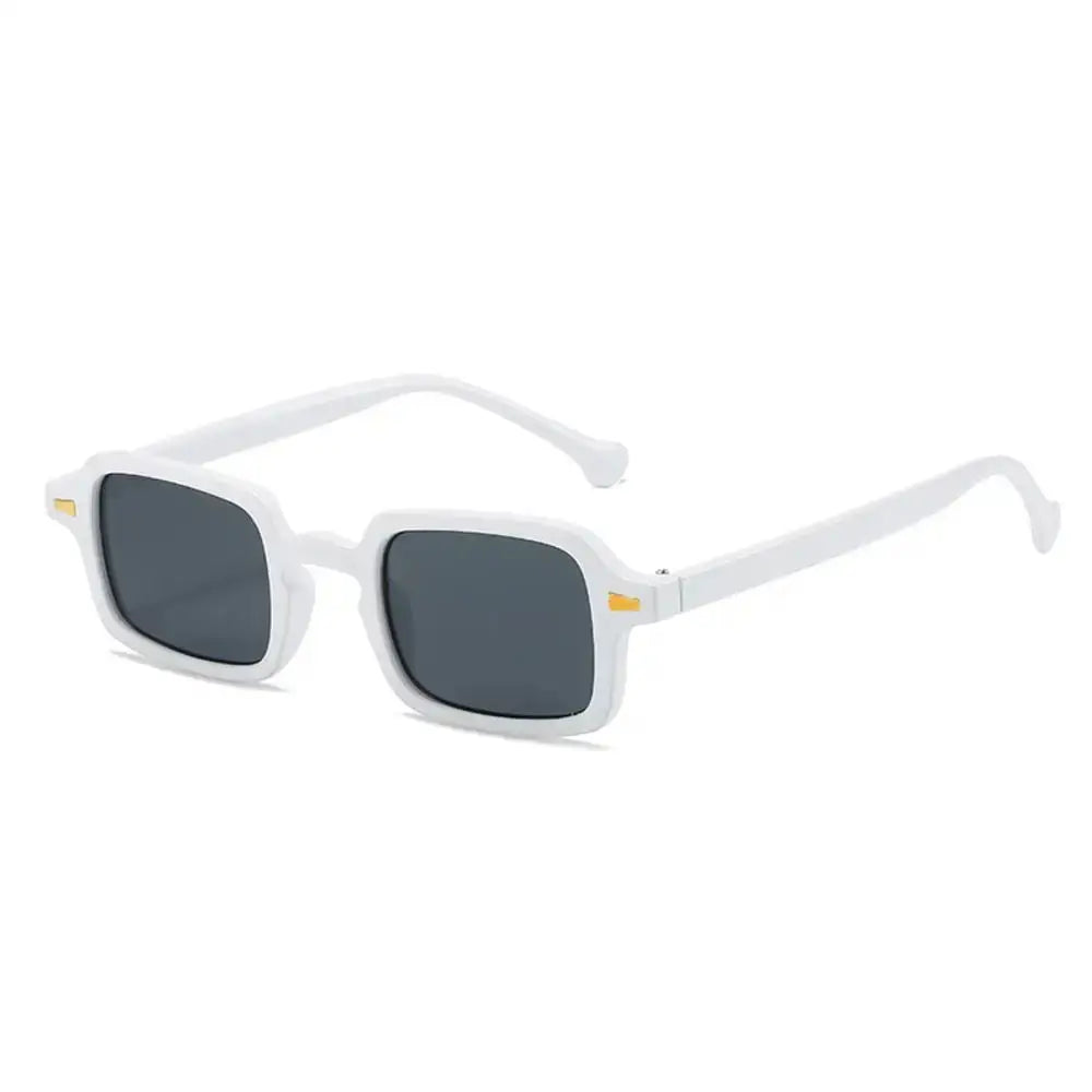 a pair of white sunglasses on a white background