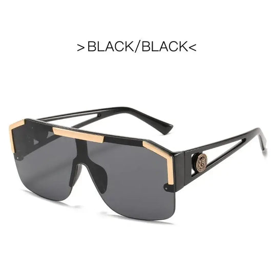 a pair of sunglasses with a black and gold frame