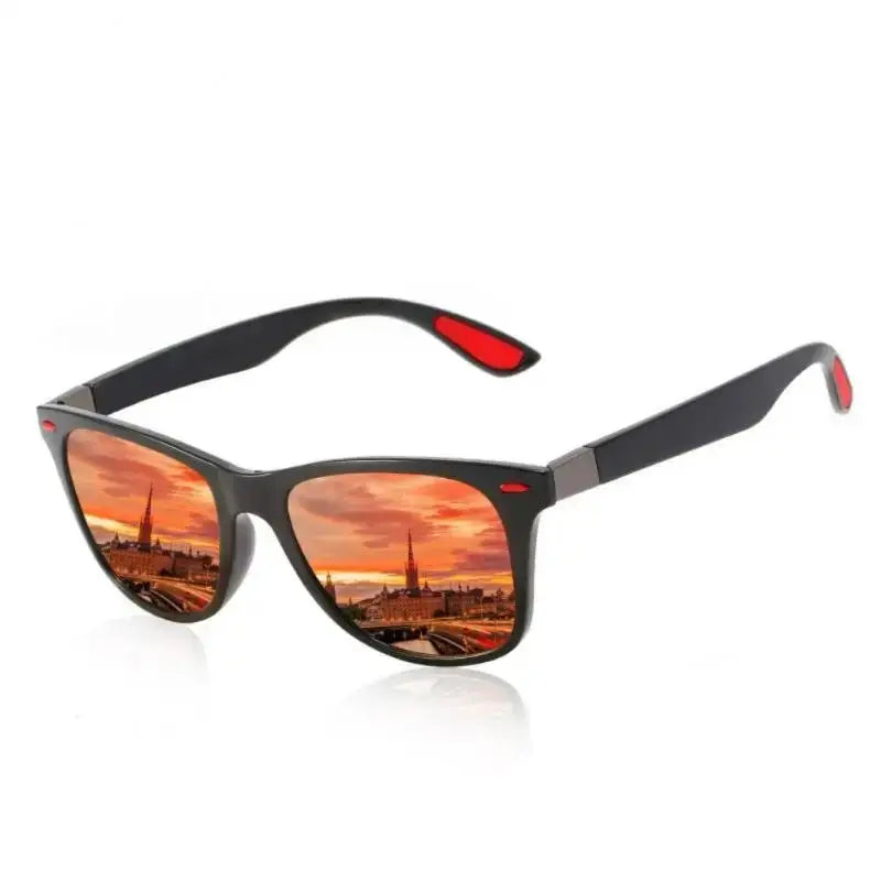 a pair of sunglasses with the reflection of a sunset