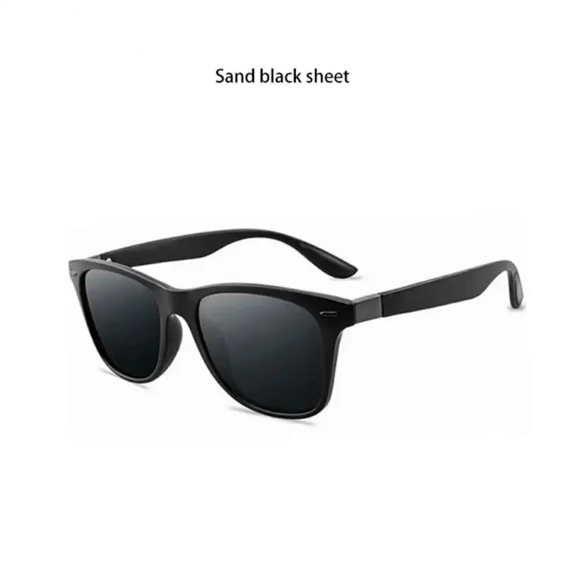 a pair of black sunglasses with a white background